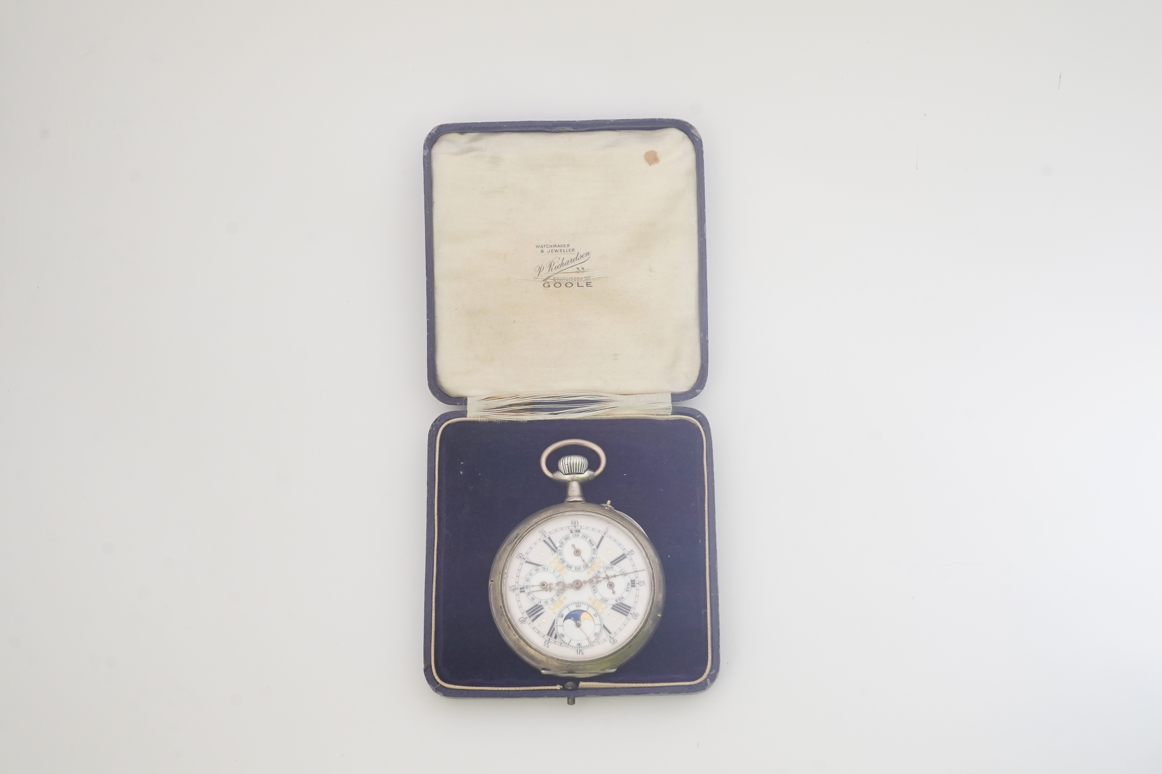 A large early 20th century German 800 standard silver open faced calendar moon phase keyless pocket watch